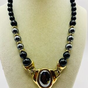Vintage Oval Hematite Pendant on a Lucite And Hematite Beaded Necklace. 17 inch